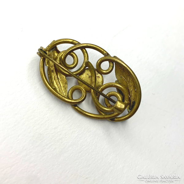 Art Nouveau copper brooch with pink stone