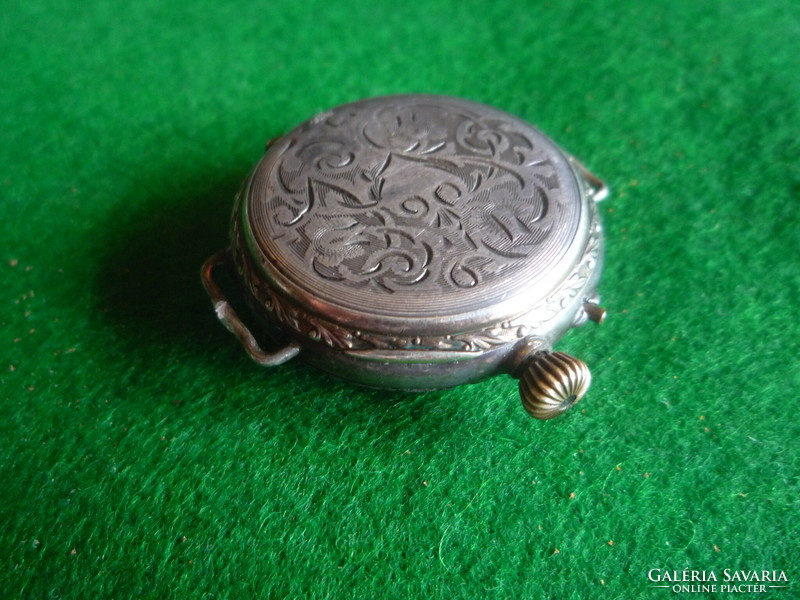 Old silver watch.