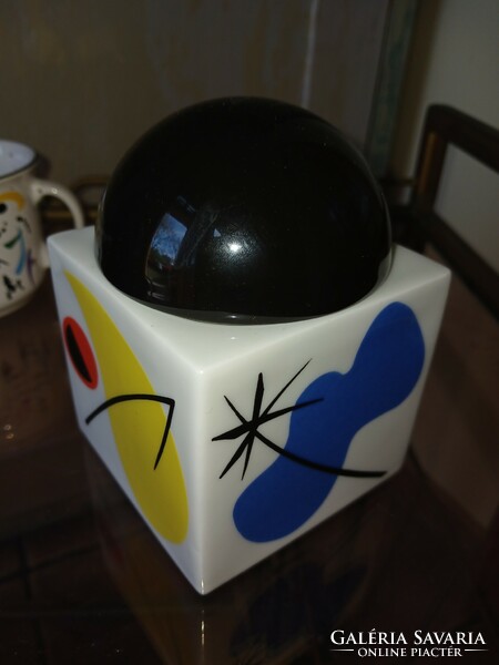 Mug and porcelain storage box in pop-art style