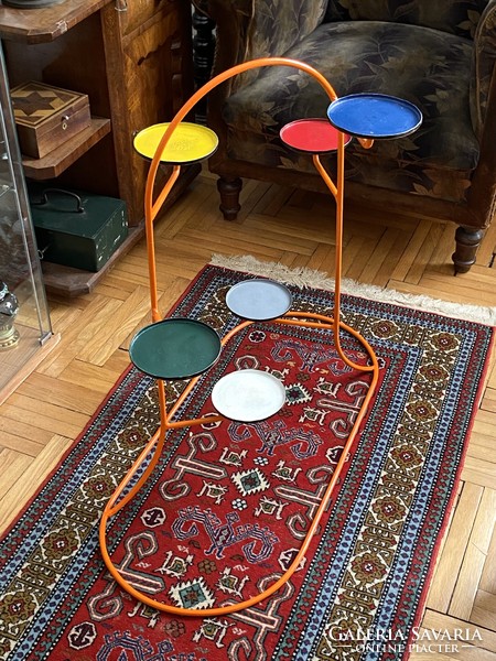 Fun retro iron flower stand decorated with colorful circles