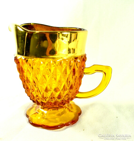 Small pourer in gilded amber glass
