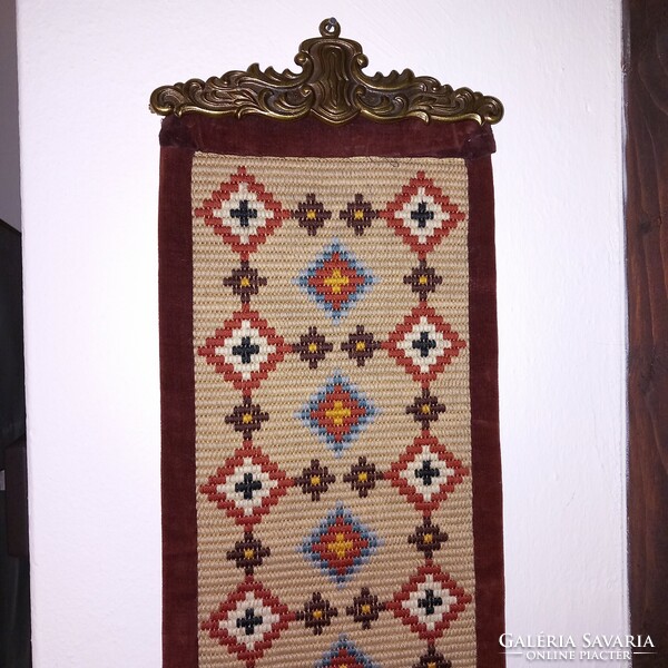 Servant bell stem with tapestry pattern. Wall decoration