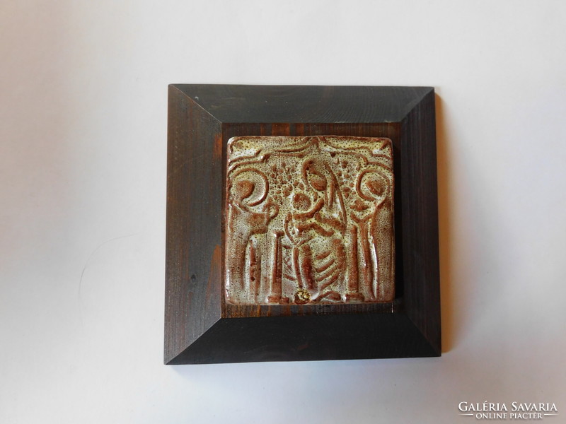 Ceramic wall decoration on a wooden sheet - madonna