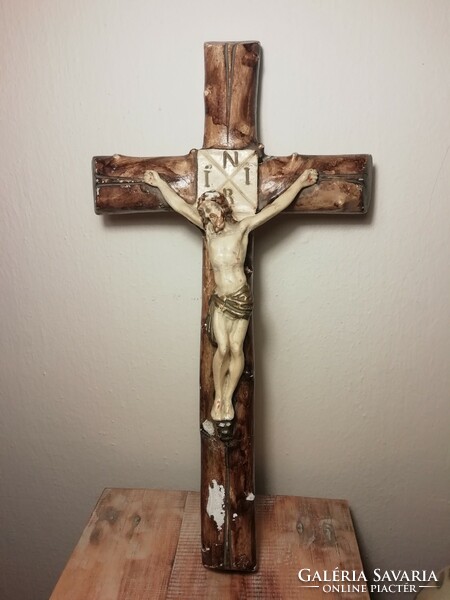Old painted plaster cross, crucifix