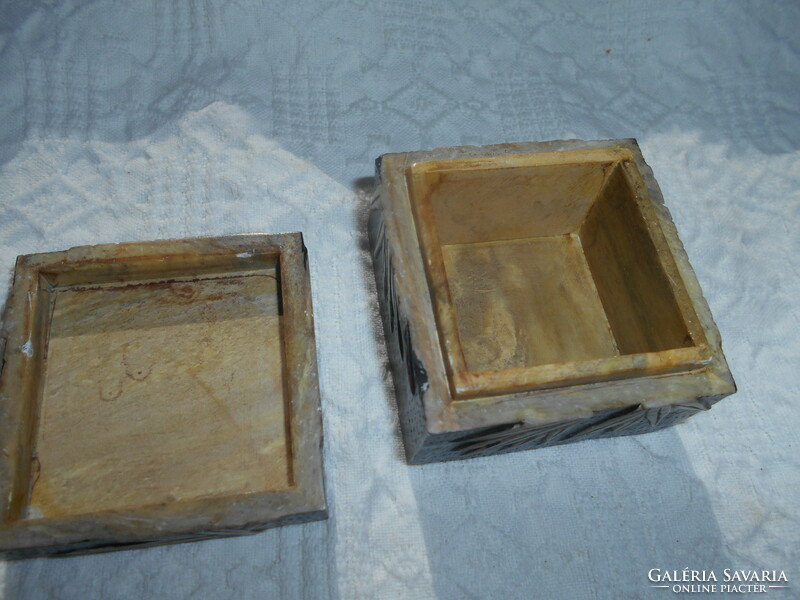 Jewelry box made of pumice stone-- with decoration running from one side to the other
