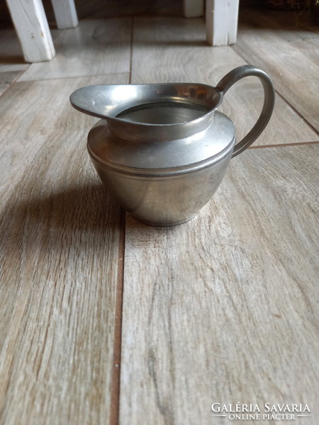 Old tin pourer and sugar bowl