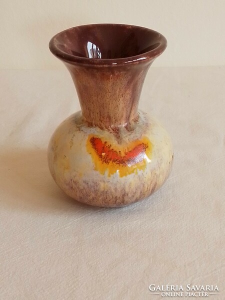 Old art deco violet mini earthenware ceramic vase with dripped glaze at the bottom with a pattern number pressed into the mass