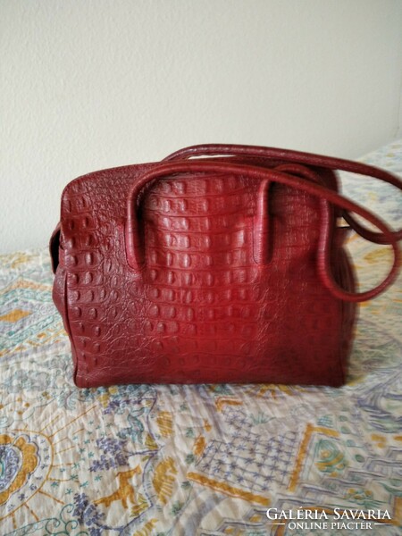 Beautiful Italian leather women's bag in burgundy color with crocodile pattern