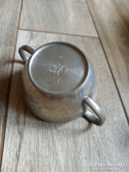 Old tin pourer and sugar bowl