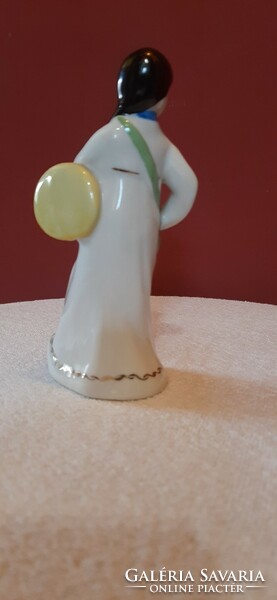 Porcelain statue. Lady with a drum. Hand painted, marked 12 cm tall statue. Presumably North Korean.