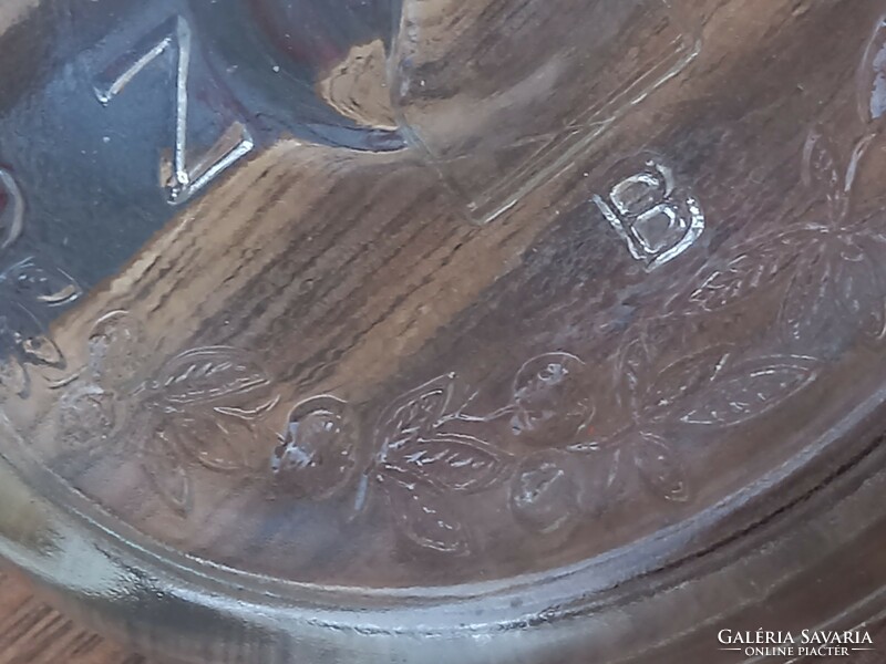 Old kitchen utensil: thick glass jar marked tokod, 