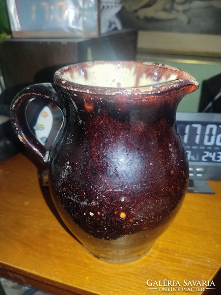 Old glazed ceramic jug
