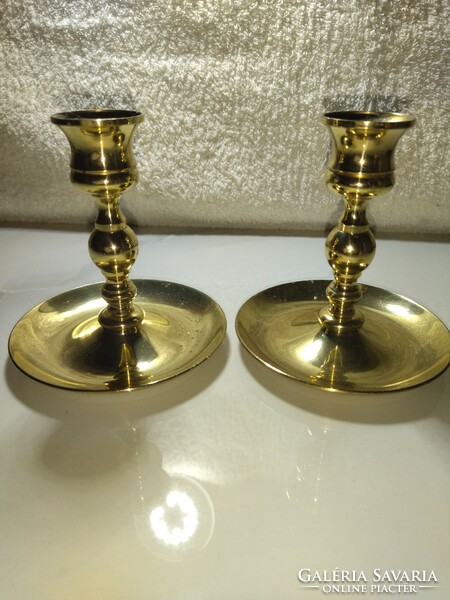 A pair of beautiful old copper candlesticks