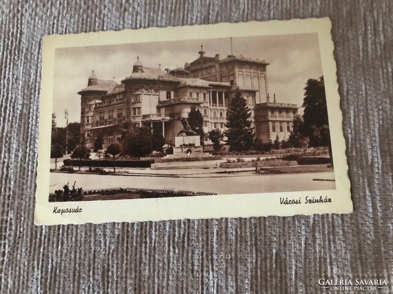 Old black and white postcard. Kaposvár city theater with an old stamp. Written.