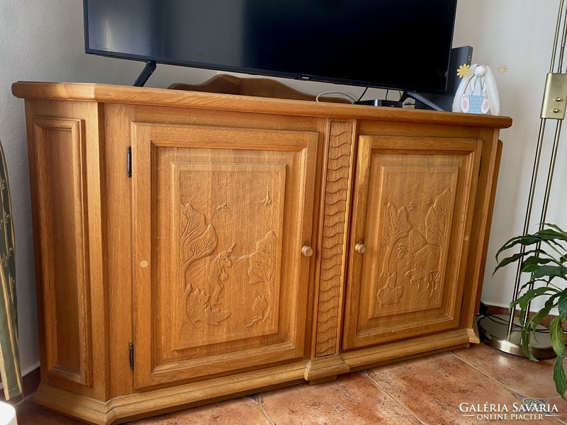 Carved oak corner cabinet/chest with hunting motifs