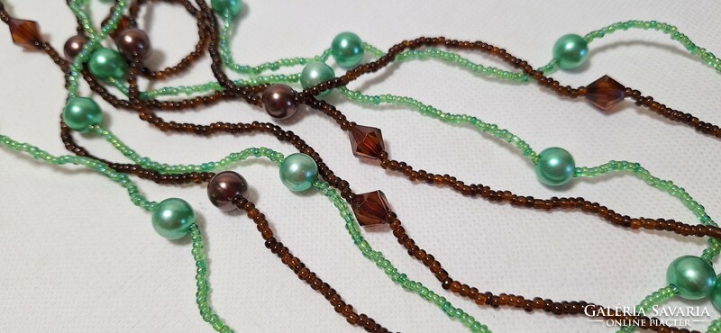 2 Long strings of glass beads
