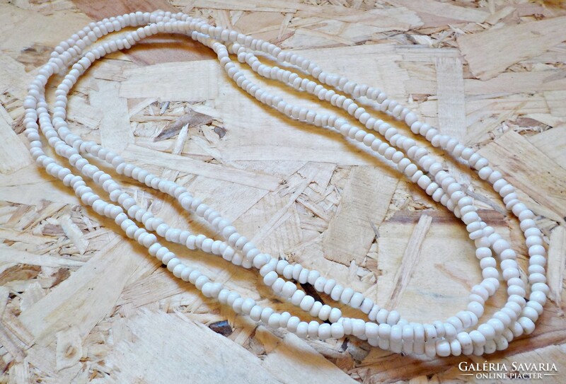 Extra long necklace with white glass beads