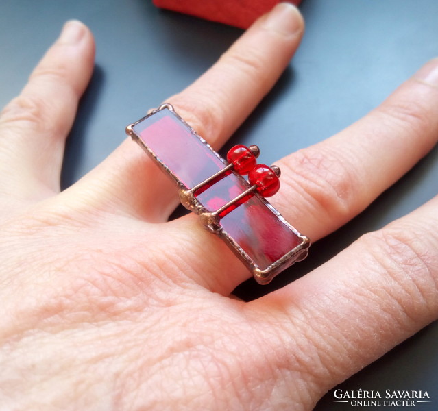 Extravagant red cocktail ring made of colored glass and pearls