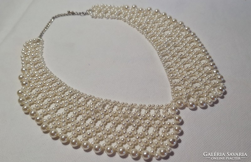 Snow white string of pearls, casual wear