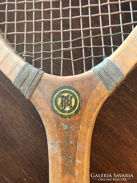 Very old wooden tennis racket. XX. No. First half. Part of the head is deformed, for decorative purposes.