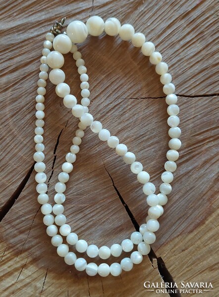 Mother of pearl/shell necklace with growing eyes
