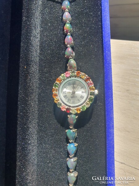 Beautiful unique silver jewelry watch with polished opals and colorful tourmalines