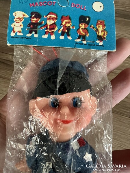 Old trafficker elf figure or Christmas tree ornament in uniform