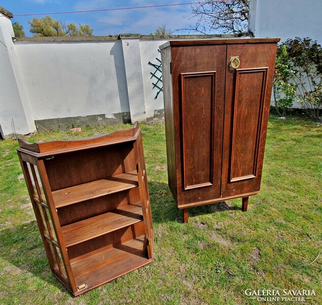 Old brown bathroom cabinets. Lower element and wall cabinet.