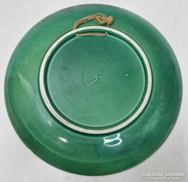 Glazed ceramic souvenir with the inscription 