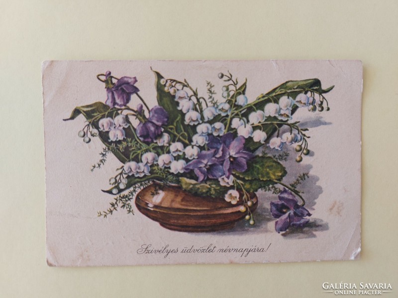 Old floral postcard with violet lily of the valley