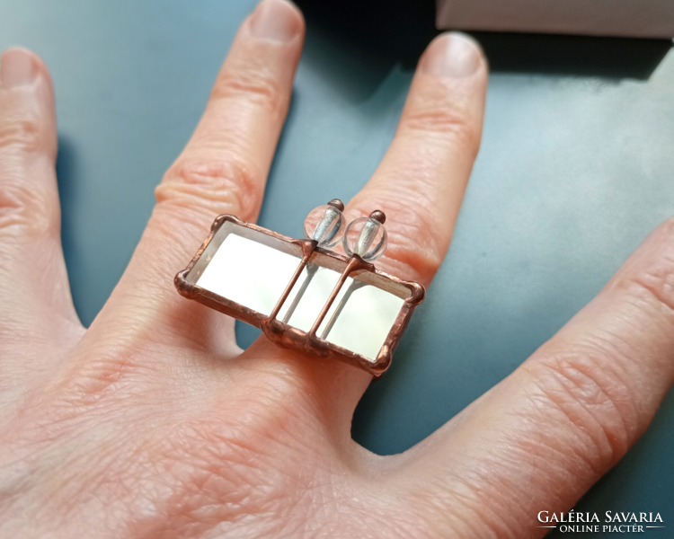 Striking and special fashion jewelry, cocktail ring made of mirror and translucent pearls