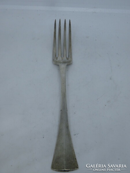 Silver fork with diana head hallmark.