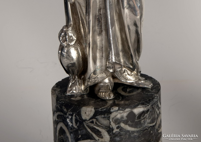 Silver statue of Pallas Athena on a marble plinth