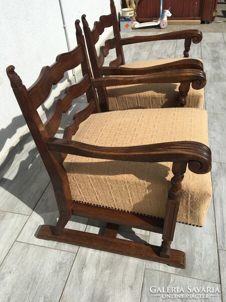 Brand new pair of oak wooden armchairs.