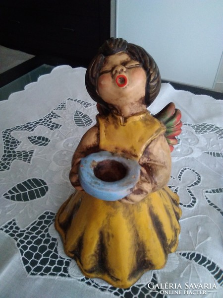 Thun ceramic angel in yellow dress with colorful angel wings, blue candle holder.