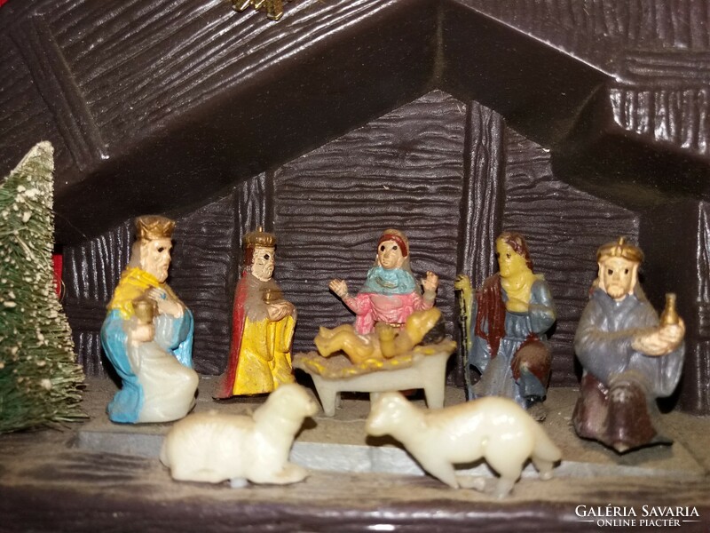 Retro smaller size plastic nativity scene under the Christmas tree can be 21 x 18 condition according to the pictures