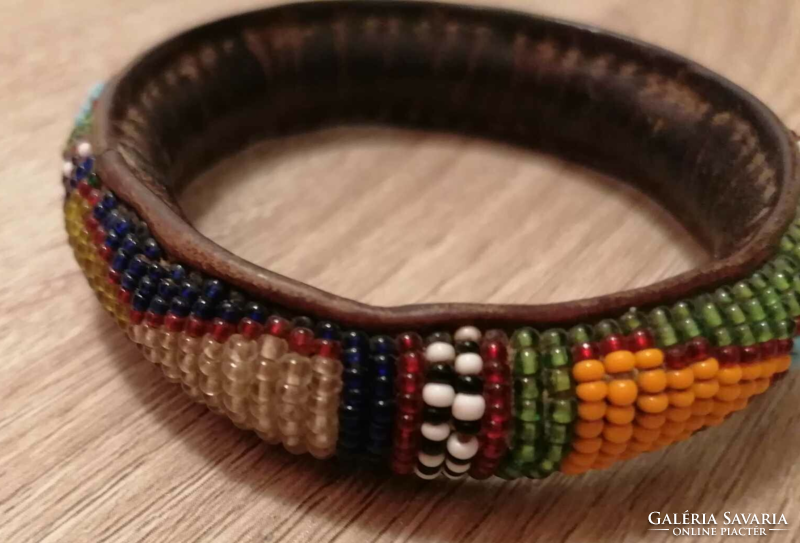 Unique special craft product (leather bracelet - decorated with pearls)