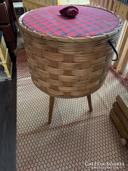 Old sewing box with wicker basket legs