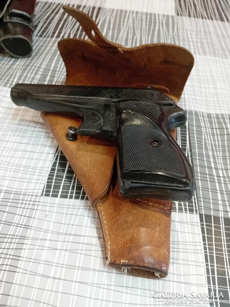 Leather holster with practice gun
