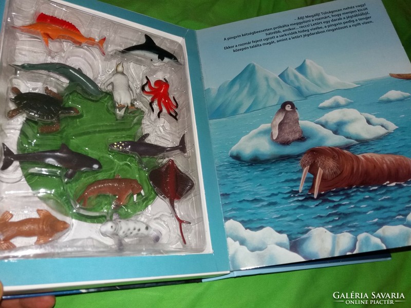 Beautiful interactive penguin and arctic animals picture book with 12 animal figures according to the pictures