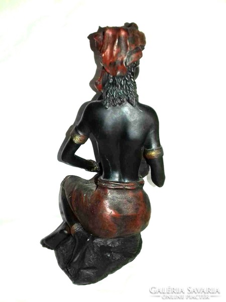 Drumming negro woman - probably a polyresin piece