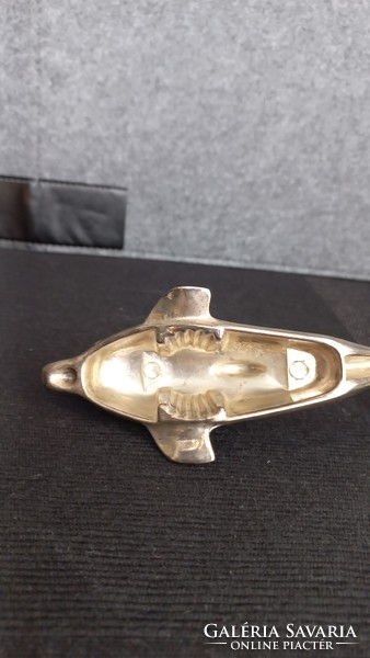 Vintage metal bottle opener in the shape of a dolphin with a screw cap in the belly, opener with chrome coating, 17 cm.