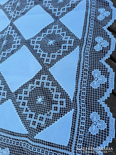 Beaten lace tablecloth