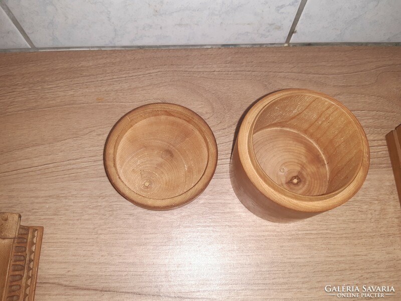 3 wooden boxes, a jar in one