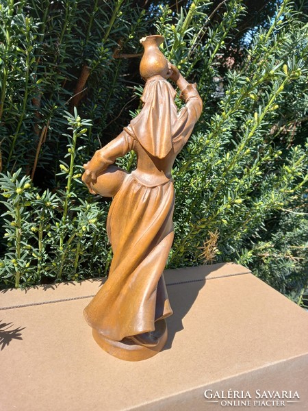 A lady carrying a jar! 30 Cm wooden statue!