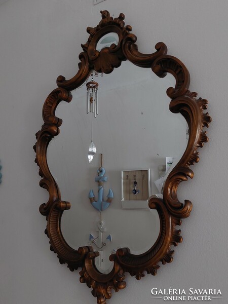 Antique carved faceted mirror