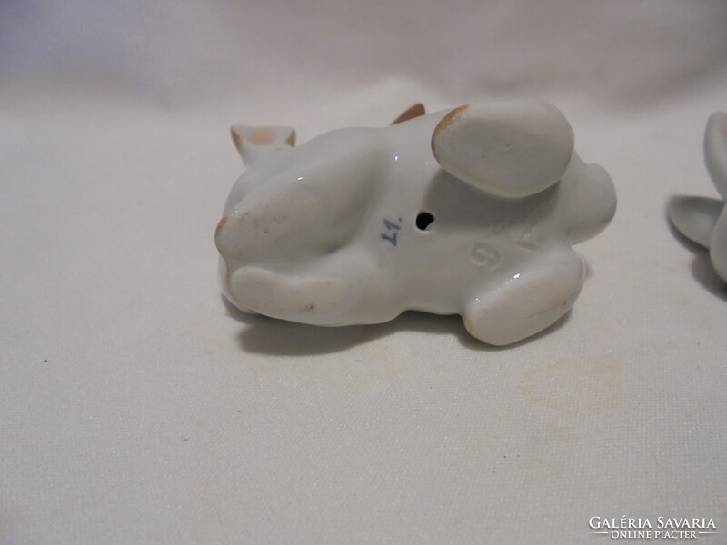 Two porcelain bunny figurines, nipp - together - one from Hóllóháza, the other serially numbered