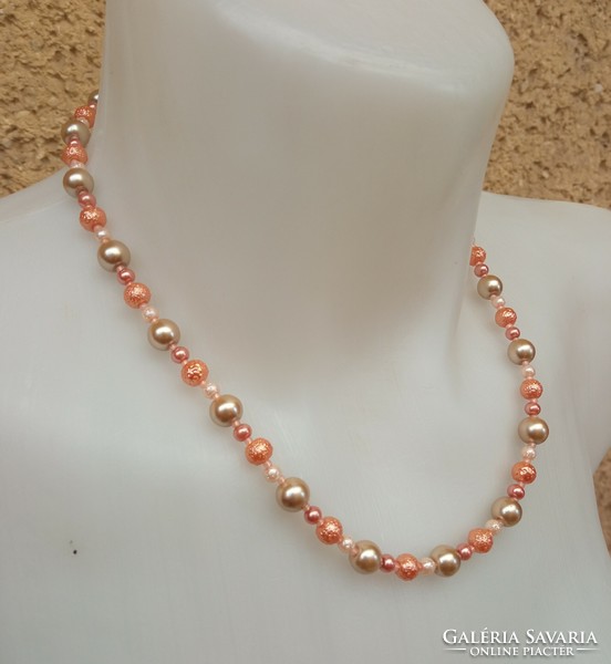 Fashion necklace with orange pearls