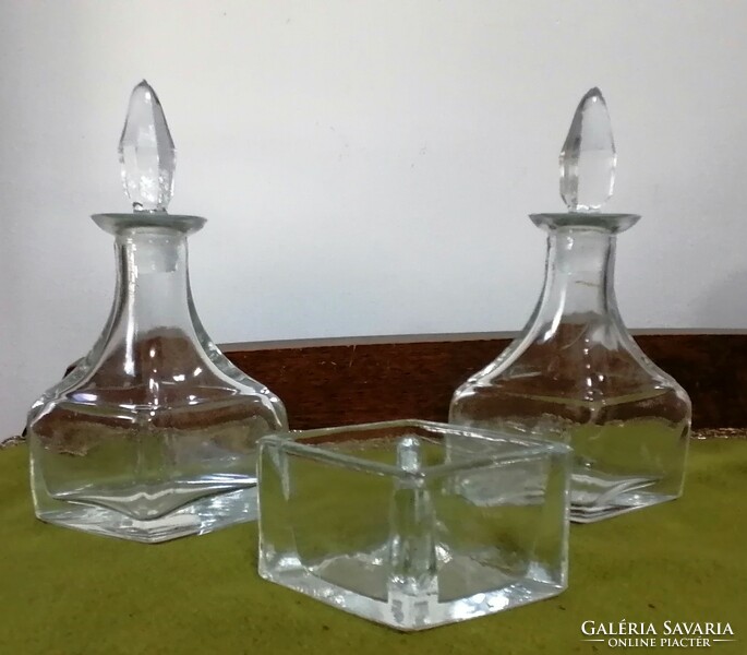 Table vinegar-oil bottle in a metal holder