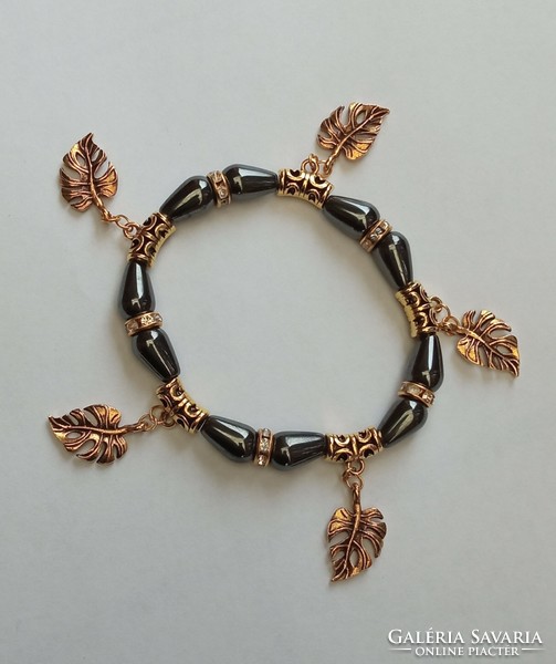 Mineral bracelet - gold-colored philodendron leaf with pendants